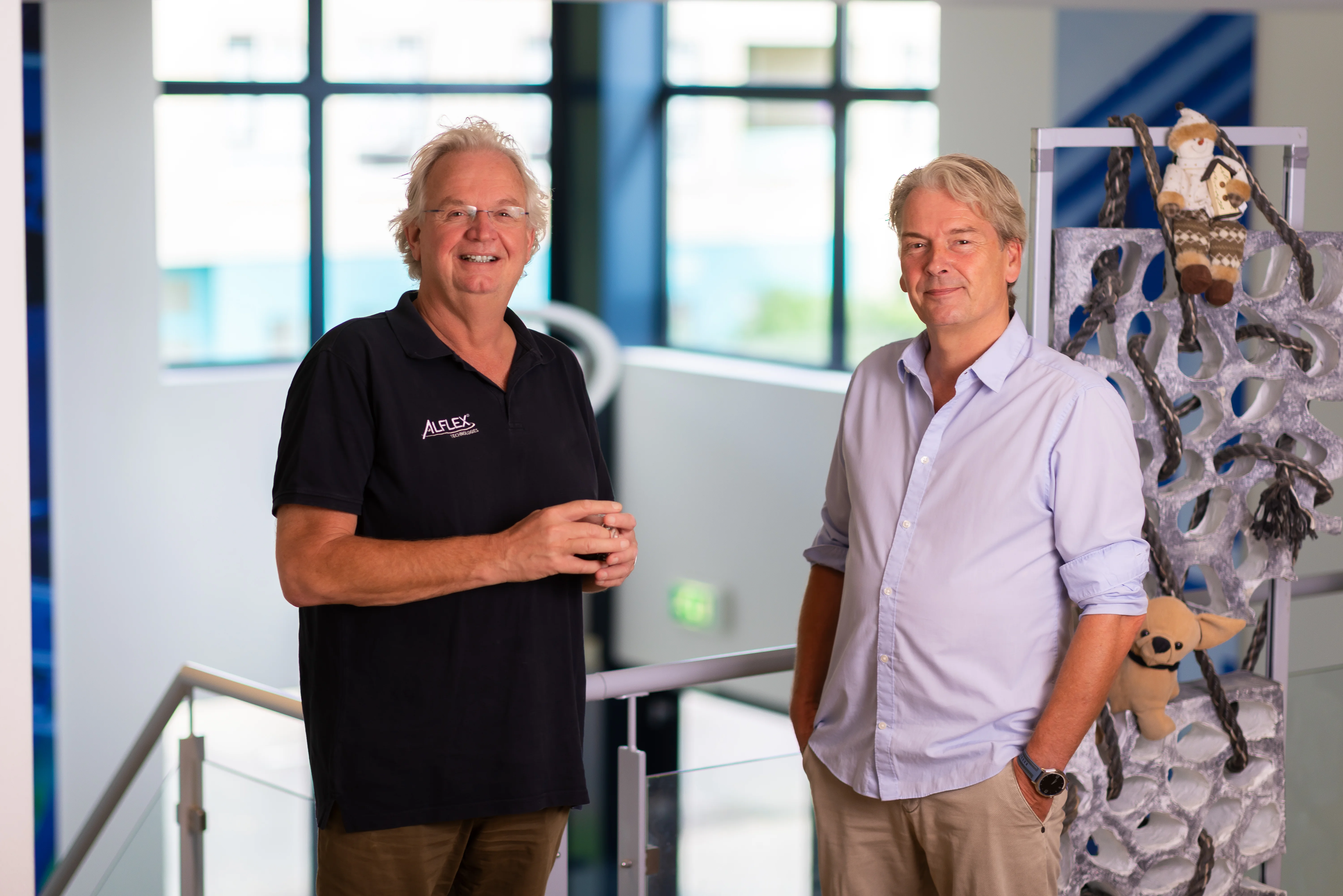 Henk en Fred contact opnemen met Alflex